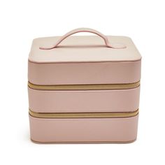 Made of vegan leather with polyester lining. Features 2 compartments and 4 pockets. Metal zipper. Imported. Spot clean. Beauty Storage, Spot Cleaner, Leather Travel, Metal Zipper, Cosmetic Case, Pale Pink, Vegan Leather, Zipper, Handbags