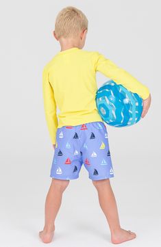 Colorful sailboats navigate swim trunks enhanced with UPF-50 protection to allow extra fun in the sun with your little one. Elastic waist Mesh liner UPF 50+ sun protection 100% polyester Machine wash, line dry Imported Down By The Bay, Sailboat Print, Fun In The Sun, Printed Swim, Sailboats, Swim Trunks, Upf 50, Sun Protection, Little One