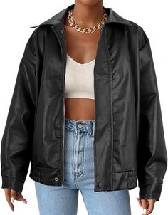 Rev up your style with this faux leather long sleeve zip up motorcycle fashion jacket. A perfect addition to your wardrobe, this jacket features a classic black color, button and zipper accents, and pockets to keep your essentials safe. The oversized fit and regular size type make it suitable for women of all shapes and sizes, while the medium size ensures a comfortable fit. This jacket is perfect for anyone who wants to achieve a 90s look style. With its motorcycle jacket style, it's ideal for anyone who wants to add a touch of edgy style to their outfit. Whether you're heading out on a ride or just want to look the part, this jacket is the perfect choice. Sizes may vary slightly from size chart. Oversized Leather Blazer, Leather Jacket Winter, Motorcycle Fashion, Pleather Jacket, Leather Jacket Women, Biker Leather Jacket, Clothes Stand, Black Faux Leather Jacket, 90s Looks