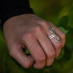 Spiral designs are as old as human kind. Wear a piece of history when you adorn your hand with this ancient design spiral ring. This design has been used since the Neolithic time, when it was carved in rock, and jewelry designs were made as early as the bronze age. Isn't it fascinating how modern and timeless this design is? I handcraft each ring from thick sterling silver. This is a durable and sturdy ring that will not bend out of shape. The silver is hammered for additional shine. Your ring w Spiral Hand Forged Sterling Silver Jewelry, Unique Spiral Sterling Silver Jewelry, Hand Forged Silver Swirl Jewelry, Unique Hand Forged Spiral Jewelry, Spiral Sterling Silver Ring Stamped 925, Handmade Sterling Silver Spiral Rings, Symbolic Spiral Sterling Silver Jewelry, Handmade Unique Swirl Rings, Spiral Sterling Silver Rings