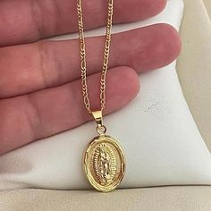 *Available In 2 Lengths: 18 Inches Or 20 Inches* New! Beautiful Gold Our Lady Of Guadalupe Necklace. Lovely Detailing & Shine! Our Jewelry Is Crafted With 10 Layers Of Solid 18k Gold Water Resistant Won’t Tarnish/Change Color Hypoallergenic Nickel Free 18 Inches Or 20 Inches Long Base Metal: Brass Composition: 18k Gold Filled Color: Gold Brand New In Box *Hablamos Espaol* M Gold Necklace, Gold Pendant Jewelry God, Latina Gold Jewelry, Gold Jewelry Long Necklace, Necklace Of God, Gods Necklace, Necklaces Guadalupe, Mexican Eagle Gold Necklace, Lady Of Guadalupe Necklace