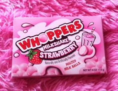 a box of milkshake strawberry flavored wh poppers with whip cream