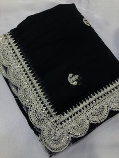 Package Contains: Saree, Blouse, Petticoat Chiffon Silk fabric with C-Pallu Embroidered work & Cutwork Border with Embroidery Work blouse Peice.   Saree  Fabric.     :- Zomato Chiffon Silk  Work        :- Silver codding Sequence Embroidery with cutwork Cut           :- 5.5 mtr    ��👚👚Blouse 👚👚  Fabric.     :-  Zomato Chiffon Silk Work        :- Embroidery Work  Cut.          :-  0.80 mtr (Un-stitch)  With FREE Saree fall and Piko with matching petticoat. Our Services- Stitching service is also Black Sarees, Festival Saree, Embroidery Work Blouse, Ethnic Saree, Black Saree, Pretty Blouses, Indian Saree, Embroidery Work, Blouse Fabric