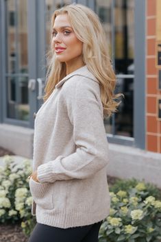 Stay cozy and chic with the Beige Button Down Sweater Cardigan, a versatile staple perfect for any season! Crafted with long sleeves and a collared neckline, this cardigan offers a classic touch to your layered looks. The button down front closure allows for easy styling, whether worn open over a tee or buttoned up for a polished finish. For a casual everyday outfit, simply pair it with leggings and your favorite sneakers. Winter Button-up Polo Sweater, Everyday Soft Knit Button-up Outerwear, Winter Collared Polo Sweater With Button Closure, Button-up Polo Sweater With Buttons For Fall, Button-up Polo Sweater For Fall, Collared Cardigan With Buttons For Winter, Collared Winter Cardigan With Buttons, Winter Collared Cardigan With Buttons, Fall Button-up Polo Sweater With Button Closure