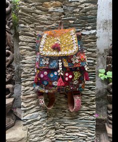 About bag  Indo-gypsy fusion, everyday use hand bag made from Banjara fabrics sourced from Vintage tribal costumes of regions of Rajastan and Gujarat. These are embellished with light catching coins, and intricate bead work tassels. Size - length 15 inches/ width 21 inches Company details:  Company name: Houseoftextile  Contact number: +919784447473  Email id: houseoftextile77@gmail.com  Shipping & custom : Delivery through one of the finest service providers : Skyway, Fedex, UPS  And DHL. Any l Multicolor Handwork Bags For Festive Occasions, Multicolor Rectangular Bag With Zari Work, Multicolor Handwork Potli Bag For Festivals, Multicolor Embroidery Bag With Zari Work For Festivals, Rectangular Handwork Festival Bag, Multicolor Embroidery Zari Work Bag For Festivals, Bohemian Embellished Bag For Festive Occasions, Bohemian Embellished Shoulder Bag For Festive Occasions, Bohemian Multicolor Potli Bag For Festive Occasions