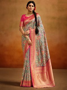 Introducing the "marvelous multi-color kalamkari printed banarasi silk festival wear saree" from Ethnic Plus! This stunning saree is crafted with the utmost care and attention to detail, making it the perfect choice for weddings, festivals, and other special occasions. Its beautiful pink color adds a touch of elegance and femininity, while the kalamkari printed work adds a unique and artistic flair.
The banarasi silk material used in this saree is known for its rich and lustrous texture, adding Trendy Saree, Engagement Saree, Half Sarees, Kalamkari Saree, Banarasi Silk Saree, Half Sleeve Blouse, Art Silk Sarees, Trendy Sarees, Silk Sarees Online