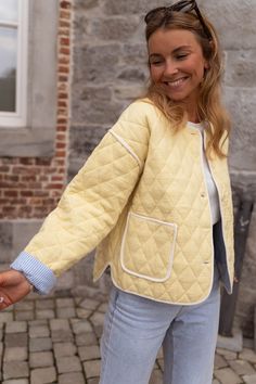 Featuring a classic quilted effect and two handy pockets at the front, this yellow jacket is the perfect blend of style and functionality. With long sleeves to keep you cozy and lining for extra warmth, it's a great layer for brisk nights ahead. Our model is also wearing the Lauren t-shirt and Maddie jeans Sizes: S-M / M-L S-M: Length 21.65 in - Width 21.26 in M-L: Length 22.44 in - Width 22.05 in 100% cotton Washing: handwash only Parisian Summer, Yellow Jacket, Light Yellow, Jeans Size, Summer Fashion, Yellow, Long Sleeve, Fashion Design, T Shirt