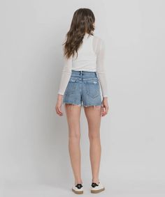 HIGH RISE A LINE DENIM SHORTS COMFORT STRETCH DENIM, HIGH RISE WAIST, DISTRESSED DETAIL, RAW HEM, A LINE DENIM SHORTS F . RISE: 10" / INSEAM: 3 3/4" / LEG OPENING: 23 1/2" MODEL IS 5'9" WEARING SIZE 26 Lounge Dress, Flying Monkey, End Of Season Sale, Winter Sale, Stretch Denim, Jumpsuit Dress, Best Sellers, Jumpsuit Romper, Denim Shorts