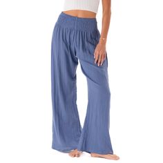 Getting dressed just got easier. Trendy yet timeless, these cotton gauze wide leg pants feature a smocked high waistband and flowy fit from the knee down. Handcrafted with 100% cotton gauze fabric and prioritizing comfort, these pants are ideal for every occasion. Whether it's a day at the beach or a night on the town, you'll be stepping out with both style and ease. ✨ Looking for Pockets? Check out our Black Cotton Cabana Pants ✨ Handmade in Thailand; each pair comes with the photo and story of Flowy Cotton Bottoms For Beach, Flowy Cotton Bottoms For The Beach, Solid Color Bohemian Wide Leg Pants For Vacation, Bohemian Solid Color Wide Leg Pants For Vacation, Bohemian Style Solid Color Wide Leg Pants For Vacation, Flowy Cotton Beach Bottoms, Bohemian Solid Color Harem Pants For Vacation, Cotton Flowy Bottoms With Elastic Waistband, Full Length Cotton Wide Leg Beach Pants