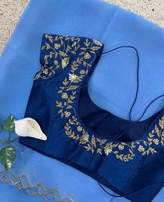 Hand embroidered ready made saree blouse with saree /blue crop top/stitched saree blouse usa /orgajza  saree blouse/modern blouse/zardosi blouse/blue organza saree blouse/ pure silk blouse/ silk saree with maggam work blouse        It is very true that a perfect blouse is the one which makes your saree look stand out !! If you find one of such a style that you have been wanting to have then dont let it go !! we carry such unique trending blouses that instantly add a stylish look to any saree !!     Well..!! we understand that you may not get in your desired size/pattern, here you go with customization according to your size/pattern which we can deliver in 1-2 weeks of time period !!      Here is a beautiful Hand embroidered zardosi work saree  in ice blue color that has golden shade cutwor Traditional Blue Pre-draped Saree With Floral Embroidery, Blue Fitted Tissue Silk Pre-draped Saree, Blue Fitted Pre-draped Tissue Silk Saree, Blue Pre-draped Saree With Unstitched Blouse In Tissue Silk, Blue Tissue Silk Blouse Piece For Party, Blue Pre-draped Tissue Silk Saree With Unstitched Blouse, Fitted Blue Tissue Silk Blouse Piece, Fitted Blue Tissue Silk Choli, Blue Organza Unstitched Blouse Piece