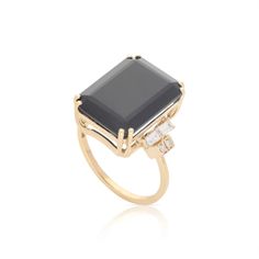 This Art Deco Octagon Ring offers timeless style and elegance. Expertly crafted with a unique octagon shape, this ring has a classic look that you will treasure for years to come. Its intricate geometric design gives it a distinctive appeal, making it the perfect statement piece for all occasions. Timeless Octagon Rose Cut Diamond Ring, Elegant Octagon-shaped Jewelry For Evening, Elegant Octagon Shaped Jewelry For Evening, Modern Rings With Octagon Center Stone, Modern Octagon Rings With Center Stone, Timeless Octagon Rose Cut Diamond Jewelry, Refined Formal Rings With Rose Cut Diamonds, Elegant 14k Gold Octagon Emerald Ring, Elegant Octagon Emerald Ring In 14k Gold