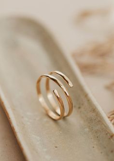 A wire wrapped ring created by Hello Adorn to make a wrap ring look like 2 rings together using thicker wire Confetti Rings, Copper Uses, Everyday Wear Jewelry, Rings Handmade, Wrap Ring, Ring Sizer, Wrap Rings, Jewelry Cleaner, Keep It Simple