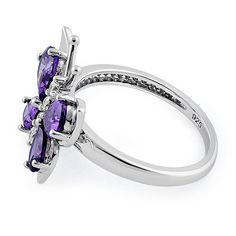 Top of ring height: 16mm Top of ring width: 16.5mm Band width: 2mm  Stone material: purple & clear cubic zirconia Center stone size: 7mm x 4mm Stone shape: pear shape & round Center stone carat weight: 0.7 ct. Total number of CZ stones: 4 Stone setting: prong setting  Metal: 925 sterling silver Plating: rhodium plated  Finish: high polish Womens Purple Butterfly Ring, Amethyst Butterfly, Stone Material, Butterfly Ring, Three Stone Engagement Rings, Stone Setting, Cz Ring, Cz Stone, Three Stone