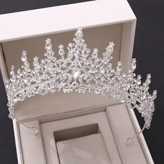 a white box with a tiara in it and the words, berlora