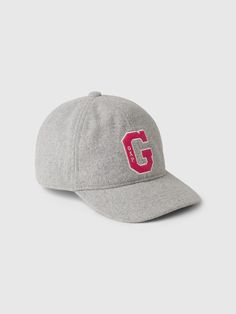 Smooth, sturdy twill weave baseball hat.  Stitching at curved brim.  Embroidered and textured Gap varsity "G" logo at front.  This product was made in a factory that invests in gender equality and women’s empowerment.  Through RISE Reimagining Industry to Support Equality) and Gap Inc. ’s program P. A. C. E.  Personal Advancement & Career Enhancement), we support people who make our clothes to build the skills, knowledge, confidence, and resilience needed to advance in work and life.  Learn more Gap Logo, Logo Baseball, G Logo, Gender Equality, Support People, Twill Weave, Gap Kids, Kids Logo, Baseball Hat