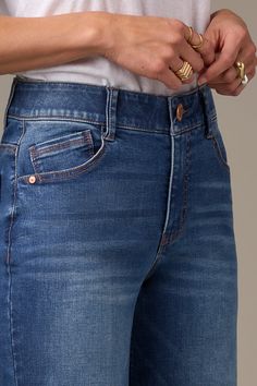 This blue Sam Wide Leg jean in petite sizing is a timeless staple. It has a high rise wais, fading and whiskering details, and our signature Contour Shape Technology, including ultra-stretchy denim and a sweetheart shaped back yoke. • Petite• Blue• Denim• 1% spandex• Button and zip fly closure• Five-pocket styling• Fading and whiskering details• “W” pendant• Sweetheart shaped back yoke• Contour Shape Technology #LP26521XZP Missy Dresses, Denim Workwear, Fall Must Haves, High Rise Wide Leg Jeans, Blouse Short Sleeve, Petite Jeans, New Tops, Trouser Pants, Wide Leg Jeans