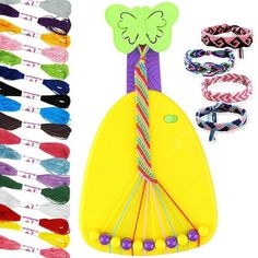 an assortment of colorful hair ties and clips with butterfly on top, next to each other