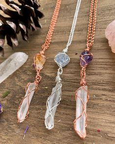 "☾ Double Amethyst + Quartz Necklace ☾ High quality, small gemmy Amethyst in its raw form, above a raw clear quartz point, in a secure & subtle setting that highlights the stones These pendants come in pure copper or sterling silver. Choose from an adjustable Faux leather chord (vegan friendly) a matching 18\" copper chain or a matching 18\" sterling silver chain. Faux leather chords are \"vegan friendly\" because they are actually cotton made to look like leather. These chords are also tied Hand Wrapped Purple Crystal Necklace For Gifts, Handmade Amethyst Amulet Crystal Necklace, Amethyst Natural Stones Necklace Gift, Unique Crystal Necklaces As Gift, Amethyst Necklace With Natural Stones As Gift, Spiritual Amethyst Crystal Necklace Gift, White Amethyst Spiritual Necklace, Hand Wrapped Crystal Pendant Necklace For Gift, Spiritual White Amethyst Necklace