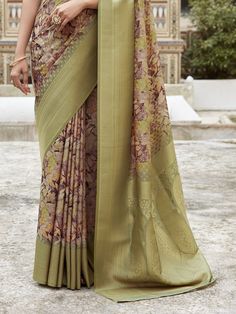 This stunning saree features a beautiful digital print design on green color tissue silk fabric, with intricate zari weaving borderwork for an added touch of elegance. The saree comes with a matching silk blouse with print work, completing the look for any festive occasion or event.
The 5.50-meter saree and unstitched blouse material ensure a perfect fit for any body type. The lightweight fabric makes it comfortable to wear all day long without compromising on style. The vibrant green color and Green Floral Print Traditional Wear, Green Pre-draped Saree With Printed Motifs For Diwali, Green Chanderi Traditional Wear With Floral Print, Green Floral Chanderi Traditional Wear, Green Floral Print Chanderi Traditional Wear, Green Floral Print Traditional Wear For Festivals, Unstitched Green Floral Traditional Wear, Green Pre-draped Saree With Printed Motifs, Green Pre-draped Saree With Floral Print