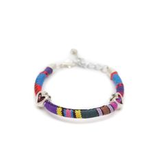 These fun, casual, and gorgeous bracelets are one of our best sellers and are perfect for adding some 'boho flair' to any outfit! Each piece features beautiful and colorful Guatemalan fabric wrapped around a bracelet that is detailed with silver beaded accents. Wear one or stack them - collect them all! As always... Handmade and Fair Trade! 7 1/2" L 100% Cotton Fabric Silver Beads and Clasp Colors/Patterns Will Vary Price is for one random Bohemian Fabric and Bead Bracelet WARNING: CHOKING HAZAR Adjustable Woven Multicolor Wrap Bracelet, Trendy Woven Beaded Bracelets For Festival, Multicolor Bohemian Beaded Bracelets, Trendy Multicolor Woven Beaded Bracelets, Bohemian Multicolor Braided Bracelets With Colorful Beads, Multicolor Bohemian Braided Bracelets With Colorful Beads, Hippie Multicolor Beaded Wrap Bracelet, Multicolor Woven Hippie Jewelry, Trendy Multicolor Woven Jewelry