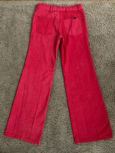 "Vintage Women's 70's Red, Low Rise, Bell Bottom, Jeans by Cheap Jeans (S) 1378 These Ladies jeans come in red colored denim and are low waisted, with two front pockets with two back pockets with a bell bottom leg shape. The denim is soft like a pant and does not stretch. Cotton/Polyester Blend *These pants are slightly too small for the mannequin and the zipper works properly. *If shipped within the US, this will go Priority Mail for a quick delivery! Size: (S) Modern Day 2 Waist: 28\" Hips: 32 Red Cotton Jeans With Pockets, Red Full Length Cotton Jeans, Red Retro Denim Bottoms, Red Mid-rise Cotton Jeans, Retro Red Wide Leg Jeans, High Waist Red Flare Jeans, Retro Red Jeans For Spring, Retro Red Spring Jeans, Retro High Waist Red Jeans