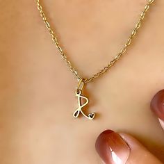 316L Stainless Steel Initial Necklace for Woman  ・ Anti-allergic ・ High Quality 14K gold PVD plated ((Not Fade, Waterproof )） ★Material → 316L Stainless Steel (SUS316L）/ Freshwater Pearl ★Size→42cm(cable chain)+8cm(Extender)+ Freshwater Pearl(5mm×3mm) ★Initial charm Size→10ｍｍ×5-10ｍｍ(TOP charm)   ★Color→Silver(Never Fade  Steel color)/ Gold (14K golg  PVD plated)/ Pink Gold (14K gold PVD plated)  All of our jewelry is handmade and original materials are used.  It does not cause any skin problems. No Tarnish problems.  From the moment you place your order, we start its production. professionally produce and sale stainless steel jewelries,  (Handmade) From JAPAN  Which has high resistance to rust, corrosion and tarnishing.  Stainless steel is one of the most bio-compatible metals,  so stainle Gold Hypoallergenic Charm Necklace For Personalized Gift, Personalized Hypoallergenic Gold Charm Necklace, Gold Initial Necklace With Heart Charm For Personalized Gift, Dainty Yellow Gold Initial Necklace For Birthday, Personalized Gold Heart Pendant Initial Necklace, Gold Hypoallergenic Charm Necklaces For Birthday Gift, Hypoallergenic Gold Charm Necklaces For Birthday, Hypoallergenic Gold Charm Necklace For Birthday, Hypoallergenic Gold Charm Necklaces For Birthday Gift