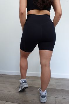 Our Power Pocket Shorts have a buttery silk like material, with a high rise fit. They contain a core stability to hug you in all the right places and have double pockets. 75% Nylon, 25% Spandex Model is wearing a size small. Waist: 28 in. Hips: 35 inch. Compressive Biker Shorts With 5-inch Inseam For Yoga, Sporty Activewear With 5-inch Inseam And Side Pockets, Stretch Mid-thigh Bottoms With Pockets, Stretch Bottoms With Pockets, Mid-thigh Length, Black Compression Bottoms With 5-inch Inseam, Black Gym Bottoms With 5-inch Inseam, Fitted Training Shorts With Pockets, High-waist Nylon Activewear With Built-in Shorts, Sporty Yoga Bottoms With Hip Pockets