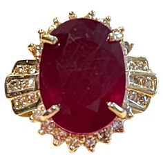 16 X11 Oval Cut Approximately 12.28 Carat Treated Ruby 14 Karat Yellow Gold Ring Size 6 Diamond Brilliant cut approximately 1 ct , Its a treated ruby prong set 14 Karat Yellow Gold: 8.1 gram with stone Ring Size 6 ( can be altered for no charge ) Extremally beautiful and solidly make ring. Diamonds are very fine quality. This ring is on clearance and is priced very competitively. It's a vintage piece with gold frame work, adding to its charm and value. While the pictures are from a phone and not Luxury Antique Oval Ruby Ring, Make Ring, Stunning Aesthetic, Frame Work, Add Pictures, Mexican Jewelry, Earrings Design, Yellow Stone, Minerals And Gemstones