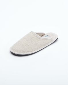 The Le Clare women's Stella in beige is the classic "hotel slipper" reimagined in luxurious boiled wool. This quintessential house slipper provides delicate comfort, featuring our premium Italian boiled wool fiber, the slipper gently conforms to your foot for cozy comfort. Classic Closed Toe Winter Slippers, Soft Beige Slip-on Slippers, Classic Slip-on Indoor Slippers, Classic Winter Slippers With Rubber Sole, Comfortable Cream Slip-on Slippers, Beige Soft Slippers, Beige Soft Comfortable Slippers, Comfortable Soft Beige Slippers, Beige Indoor Slippers