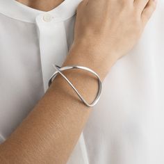 Infinity sterling silver bangle for women | Georg Jensen Georg Jensen Jewelry, Georg Jensen Silver, Wrap Bangles, Scandinavian Jewelry, The Bangles, Infinite Love, Infinity Jewelry, Minimalist Bracelet, Georg Jensen