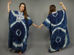 "Fabulous Moroccan style caftan dress. Made of tie dye cotton fabric with lovely soutage embroidery. Excellent vintage conditions. Fabric: cotton Size: one size fits most ✂------m e a s u r e m e n t s-------------- Bust and waist already doubled. Bust waist hips: 93\" 236 cm Length: 58\" 148 cm Please read item description and measurement carefully. Please always check our Shop Policies before purchasing. Every items at PaperMoonDress has been carefully washed or dry cleaned and ready to wear." Blue Cotton Kaftan With Batik Print, Traditional Blue Kaftan With Batik Print, Spring Bohemian Batik Print Kaftan, Spring Bohemian Kaftan With Batik Print, Bohemian Blue Tunic Thobe, Bohemian Blue Long Thobe, Bohemian Long Blue Thobe, Spring Bohemian Thobe, Blue Folk Style Kaftan For Festivals