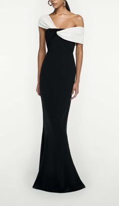 Make a Showstopping Entrance in This Dramatic Black Maxi Dress With an Asymmetric Off-The-Shoulder Ruffle Neckline. The Breezy Chiffon Skirt Sways Hypnotically as You Dance, While the Slim Bodice Hugs Your Shape. Accentuate the Waist With a Belt. Step Into the Spotlight and Let This Bold Maxi Dress Do the Talking Wherever You Go. Fitted bodice and fluted hem Fabric twist at bodice Internal corset Zip fastening at side Fully lined bodice Skirt unlined Main Fabric: 97% Viscose, 3% Elastane Contras Luxury Asymmetrical Hem Midi Dress For Gala, Luxury Draped Asymmetrical Dress For Evening, Luxury Asymmetrical Dress With Asymmetrical Neckline For Dinner, Luxury Asymmetrical Dress For Evening With Fitted Bodice, Luxury Banquet Gown With Asymmetrical Neckline, Luxury Dress With Asymmetrical Neckline For Banquet, Luxury Gown With Asymmetrical Neckline For Banquet, Luxury Glamorous Dress With Asymmetrical Neckline, Luxury Elegant Maxi Dress With Cut-out Waist