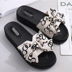 Women's Thick-Soled Bow Tie Slippers - AM APPAREL Vacation Slip-on Slippers With Round Toe, Non-slip Eva Slide Slippers, Comfortable Eva Slippers With Round Toe, White Flat Platform Slippers, Trendy Slip-on Platform Slippers For Vacation, Trendy Textured Slip-on Platform Slippers, Trendy Non-slip Round Toe Slippers, Synthetic Round Toe Slip-on Flip Flops, Eva Slip-on Slippers With Textured Footbed