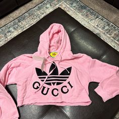 Brand New Gucci Cropped Sweatshirt. Size Xl Runs A Bit Small. Absolutely Adorable Thicker Material Pink Logo Print Hoodie For Spring, Pink Long Sleeve Sweatshirt With Logo Print, Pink Long Sleeve Sweatshirt With Logo, Pink Athleisure Sweatshirt With Logo Print, Pink Logo Print Athleisure Sweatshirt, Pink Logo Print Sweatshirt In Athleisure Style, Sporty Pink Sweatshirt With Logo Print, Pink Logo Print Sweatshirt, Casual Pink Sweatshirt With Logo Print