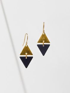 A brass mini triangle accented with colored rubberized brass. Earrings are approx. 1 inch long. Gold filled and hypoallergenic ear wires. Gold Triangle Earring, Black Triangle Earrings, Modern Triangle Metal Earrings, Gold Triangle Brass Jewelry, Nickel-free Metal Triangle Earrings, Golden Star, Ear Wires, Star Necklace, Tassel Earrings