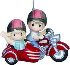 a couple riding on the back of a red motorbike christmas ornament