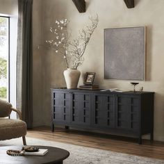 a living room scene with focus on the sideboard