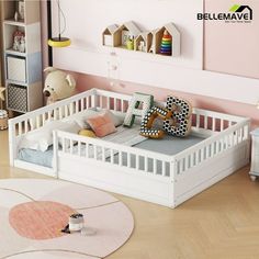 a child's bedroom with pink walls and white furniture