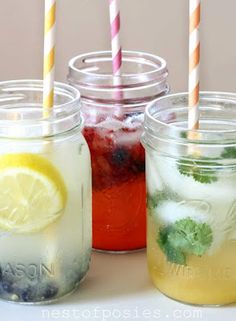 three mason jars filled with different types of drinks