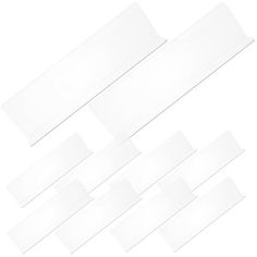 six pieces of clear plastic tape on white background