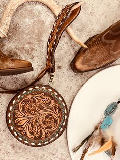 Round The West Darlin' Wristlet | gussieduponline Western Wristlet, Tooled Leather Bag, Leather Artisan, The Wild West, Leather Crafts, Round Leather, Leather Work, Genuine Leather Bags, Leather Wristlet