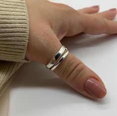 🌟 Elevate Your Style with a Silver Double Layer Ring! 🌟 Introducing our stunning Silver Double Layer Ring, a statement piece that combines elegance and versatility. 🌿 Unique Double Layer Design: This ring features a distinctive double-layered band that adds depth and texture to your look. The adjustable design ensures a comfortable fit, making it perfect for daily wear. 💍 Silver Jewelry for Women: Crafted with high-quality silver, this ring isn't just an accessory - it's a symbol of timeless Silver Thumb Rings For Women, Silver Thumb Rings, Thumb Rings For Women, Thumb Rings Silver, Layered Rings, Mothers Day Presents, Layer Design, Thumb Rings, Classic Ring