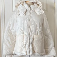 100% Authentic Womens Free People Emmy Swing Puffer Jacket (Msrp $168). This Jacket Is Brand New Without Tags! Color: Bones Size: Large Oversized, Slouchy Fit Detachable Hood Funnel Neck Zip Front Closure Front Patch Fleece Lined Pockets Long Sleeves With Ribbed Cuffs 58% Nylon, 42% Polyester Hooded Puffer Jacket For Spring, Cream Quilted Puffer Jacket For Winter, Winter Cream Quilted Puffer Jacket, Quilted Cream Puffer Jacket For Winter, White Quilted Puffer Jacket With Long Sleeves, White Quilted Puffer Jacket, White Nylon Puffer Jacket With Detachable Hood, Winter White Down Puffer Jacket With Detachable Hood, White Long Sleeve Quilted Puffer Jacket