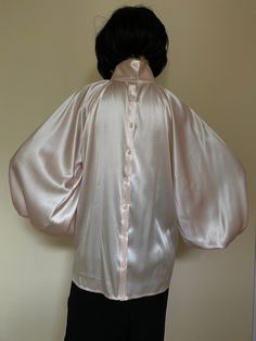 "This is a very stylish Womens Satin blouse. It is comfortable and cozy. Made for a free flowing fit. Great for all year around and for any special occasion or casual day can be dressed up or dressed down. SIZE CHART SIZE S - US 6, UK 8, EU 36 bust: bust around 34.5\"/90cm Waist: waist around 27.5\"/70cm Hips: hips around 34.5\"/90cm SIZE M - US 8, UK 10, EU 38 bust: bust around 37.5\"/95cm Waist: waist around 29.5\"/75cm Hips: hips around 37.5\"/95cm SIZE L - US 10, UK 12, EU 40 bust: bust arou Long Sleeve Satin Blouse For Daywear, Satin Long Sleeve Blouse For Daywear, Feminine Silk Blouse With Blouson Sleeves, Pink Satin Top For Evening, Silk Blouse With Gathered Sleeves For Evening, Evening Silk Blouse With Gathered Sleeves, Feminine Bishop Sleeve Party Tops, Chic Pink Bishop Sleeve Blouse, Feminine Satin Tops For Daywear