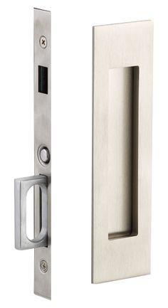 an open door handle and latch on a white background