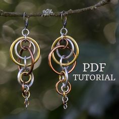 two tone gold and silver earrings hanging from a tree branch with the words pdf tutorial written below it