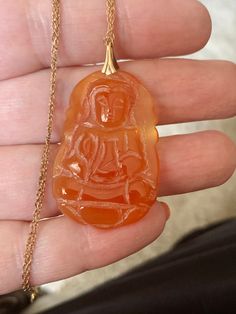 Beautiful Vintage 1/20th 14K Gold Filled Carved Carnelian Buddhist / Buddha  Pendant / Necklace Pendant measures: 1.75" with bale 24" Gold Filled Chain  Excellent Condition! Nice Gift Item! Thanks for viewing my item! Gold Carnelian Jewelry For Meditation, Carved Orange Jewelry For Gifts, Carved Orange Jewelry For Gift, Buddha Pendant Necklace, Gold Buddha, Buddha Pendant, Gold Filled Chain, Necklace Pendant, Favorite Things Gift