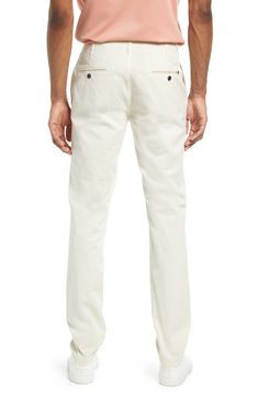 A casual alternative to business-only flat-front styles, these pants are made from comfortable stretch-cotton and tailored in a versatile straight-leg profile. 34" inseam; 14" leg opening 98% cotton, 2% elastane Machine wash, line dry Made in Portugal Fitted Straight Chinos In Casual Style, Casual Fitted Straight Chinos, Classic Straight Chinos With Five Pockets, Relaxed Fit Straight Leg Chino Dress Pants, Casual Flat Front Chinos For Business Casual, Slim Fit Chinos With Straight Hem For Spring, Tailored Casual Work Pants With Straight Hem, Casual Tailored Work Pants With Straight Hem, Fitted White Chinos With Straight Hem