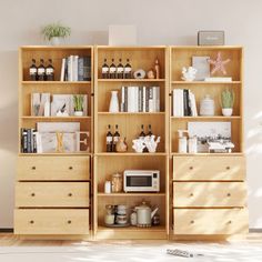 an open bookcase with many books on it