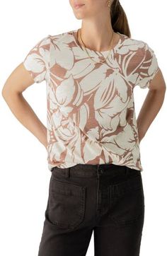 Jazz up your laid-back look with a cotton-first top covered in a groovy print. 24" length (size Medium) Crewneck Short sleeves 51% cotton, 49% rayon Machine wash, dry flat Imported Patterned Cotton Crew Neck Top, Floral Print Stretch Cotton T-shirt, Patterned Crew Neck Top For Vacation, Chic All Over Print Spring Tops, Chic All Over Print Tops For Spring, Chic Spring All Over Print Tops, Cotton Stretch T-shirt With Floral Print, Chic Spring Tops With All Over Print, Stretch Cotton Floral Print Tops